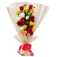 Fresh New Year Flowers in Mumbai. Send Mix Roses Bouquet in Crepe Wrap 12 Flowers to Mumbai