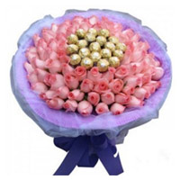Deliver Christmas Gifts to Mumbai encircled 50 Pink Roses 16 Pcs Ferrero Rocher Bouquet in Thane