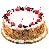 Deliver Online Rakhi with 1 Kg Eggless Heart Shape Black Forest Cakes to Mumbai