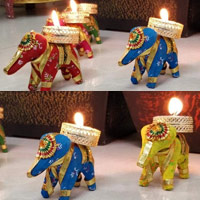 Best Gifts to Mumbai including Set of 4 Decorative Elephant T-Light/Candle Holder