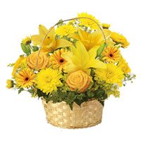 Deliver Diwali Flowers to Mumbai comprising Yellow Lily, Gerbera, Rose, Carnation Basket 12 Flowers to Mumbai Online