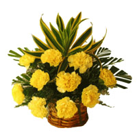 New Year Flowers Delivery to Mumbai. Yellow Carnation Basket of 12 Flowers in Mumbai