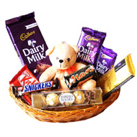 Place Online Order to Send Teddy and Gifts to Navi Mumbai that includes Basket of Exotic Chocolate With 6 Inch Teddy in Mumbai.