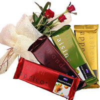 Order New Year Gifts Online Mumbai. Send 4 Cadbury Temptation Chocolates With 3 Red Roses in Mumbai