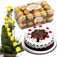 Online Delivery of gifts made of 15 Yellow Rose Basket, 1/2 Kg Black Forest Cake and 16 Pcs Ferrero Rocher Chocolates