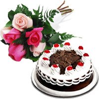 Send Online New Year Flowers to Mumbai. 6 Mix Roses 1/2 Kg Black Forest Cake to Mumbai