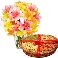 Send Diwali Gifts to Mumbai that include 10 Mix Lily Vase with 1 Kg Mix Dry Fruits to Mumbai