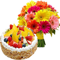 Send Friendship Presents Flowers to Mumbai. 24 Mix Gerbera 1 Kg Fruit Cake to Mumbai From 5 Star Hotel Online