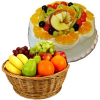 Gifts Delivery in Ahmednagar encircled with 1 Kg Fresh Fruits Basket with 500 gm Fruit Cake in Mumbai