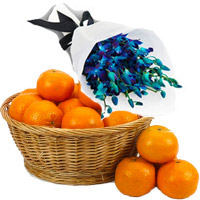 Online Friendship Day Gifts of Blue Orchid Bunch 10 Flowers Stem with 18 pcs Fresh Orange Fruits to Mumbai