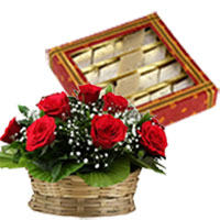 Best Diwali Gifts to Mumbai. 500 gm Kaju Katli with Basket of 12 Red Roses in Mumbai
