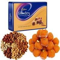 Deliver Friendship Day gifts Online 1 Kg Motichoor Ladoo and 1 Kg Dry Fruits to Mumbai with 1 Celebration pack
