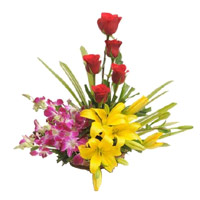 Place Online Order for Rakhi Flowers of 2 Yellow Lily 4 Orchids 5 Red Rose in Flower Basket in Mumbai