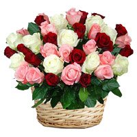 Get Christmas Flowers Online to Mumbai for Friends that is Red Pink White Roses Basket 50 Flowers to Andheri