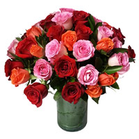 Send Pink, Red, Orange Roses Vase 24 Flowers in Mumbai. New Year Flowers in Mumbai