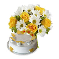 Christmas Gifts to Mumbai also with White Gerbera Yellow Roses 18 Flowers 1 Kg Pineapple Cake in Thane