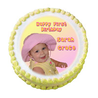 Send Online New Year Cakes to Mumbai along with 1 Kg Pineapple Photo Cakes in Mumbai