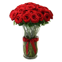 Deliver Online Rakhi with Flowers of Red Roses in Vase 24 Flowers to Mumbai