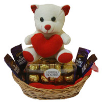 Online Diwali Gifts Delivery in Mumbai of 4 Dairy Milk 16 Ferrero Rocher Chocolates and 6 Inch Teddy Basket Mumbai for Diwali