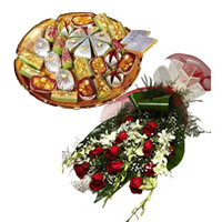 Christmas Gifts Delivery to Mumbai delivers 6 White Orchids 12 Red Roses Bunch 1 Kg Assorted Kaju Sweets in Mumbai