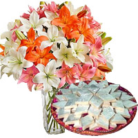 Order 18 Pink White Lily Vase Flowers in Mumbai with 1/2 Kg Kaju Katli on Diwali