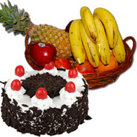 Christmas Gifts to Pune encircled with 1 Kg Fresh Fruits Basket with 500 gm Black Forest Cake in Mumbai