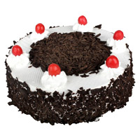 Same Day Christmas Cake Delivery to Mumbai. 500 gm Eggless Black Forest Cake in Mumbai