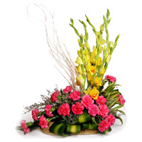 Deliver New Year Flowers to Mumbai including 18 Pink Carnation 6 Yellow Glad Flower Basket to Mumbai