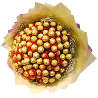 Send Christmas Chocolates to Kolhapur take in 64 Pcs Ferrero Rocher Bouquet to Mumbai.