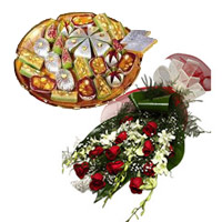 Send Online New Year Gifts to Mumbai including 6 White Orchids 12 Red Roses Bunch 1 Kg Assorted Kaju Sweets in Mumbai