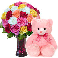 Send Online Christmas Gifts to Nashik that includes 24 Mix Roses Vase 6 Inch Teddy Bear in Vashi