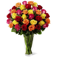 Send Birthday Flowers to Mumbai consisting Mixed Roses in Vase 50 Flowers to Mumbai
