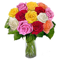 New Year Flowers Delivery in Mumbai Deliver Mixed Roses in Vase of 12 Flowers to Mumbai.