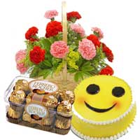 Send 15 Red Pink Carnation Basket, 16 pcs Ferrero Rocher and 1 Kg Smiley Cake in Mumbai