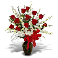 Send 5 White Orchids 12 Red Roses in Vase. Rakhi Flower Delivery in Mumbai