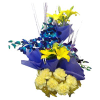 Fresh Flower Delivery in Mumbai. 4 Yellow Lily 4 Blue Orchids 6 Yellow Carnation Basket on Rakhi