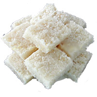 Order Online Christmas Gifts in Ahmednagar including 1 Kg Coconut Barfi in Mumbai